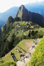 Tourist lying down at Machu Picchu, Peru